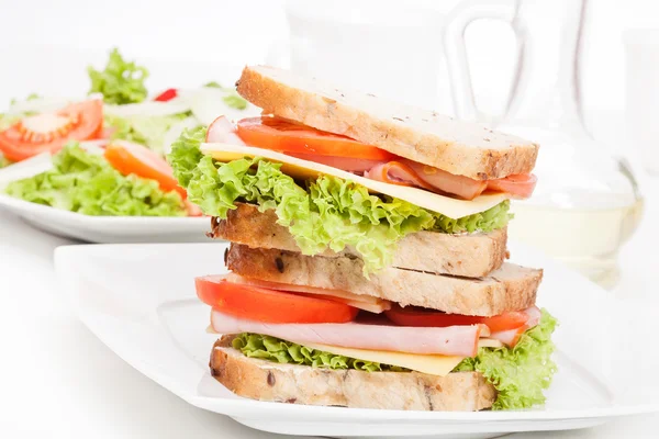 Ham and cheese sandwiches on plate — Stock Photo, Image