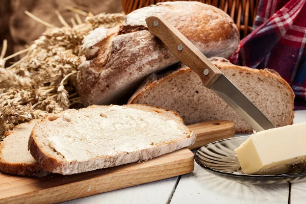 Fresh bread with butter — Stock Photo, Image
