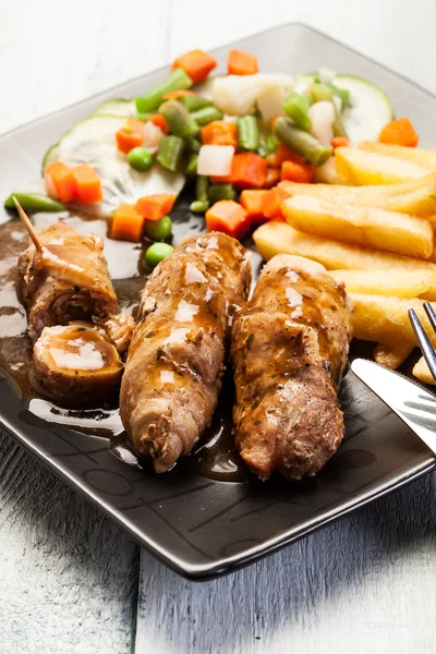 Beef rolls and vegetables — Stock Photo, Image