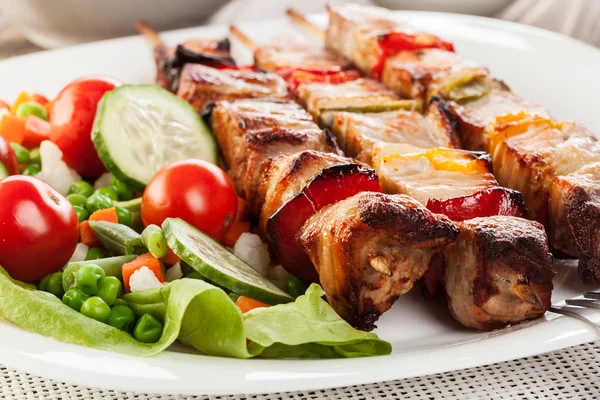 Grilled shashlik with vegetables — Stock Photo, Image