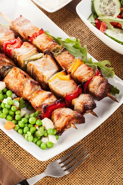 Grilled shashlik with vegetables — Stock Photo, Image