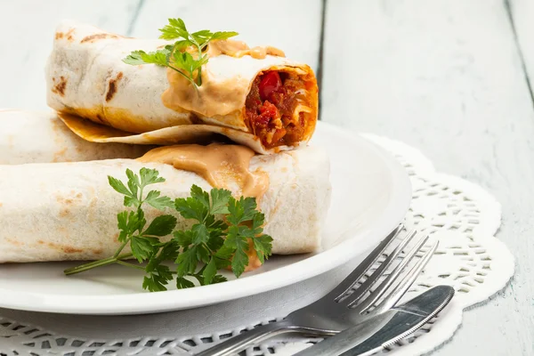 Mexican burritos on a plate — Stock Photo, Image