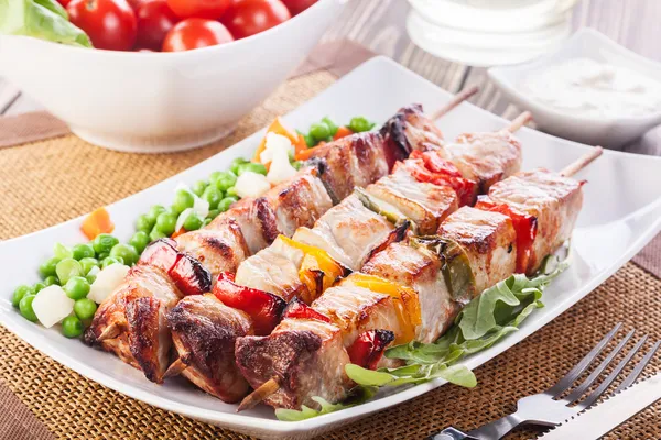 Grilled shashlik with vegetables — Stock Photo, Image