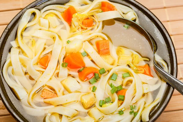 Broth - chicken soup with noodles — Stock Photo, Image