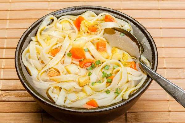 Broth - chicken soup with noodles — Stock Photo, Image