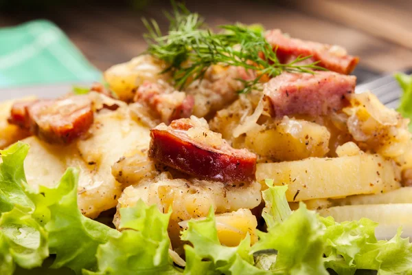 Scalloped potatoes with sausage and bacon — Stock Photo, Image
