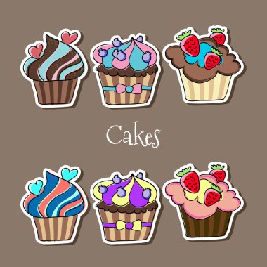 Vector set of delicious cupcakes. clipart