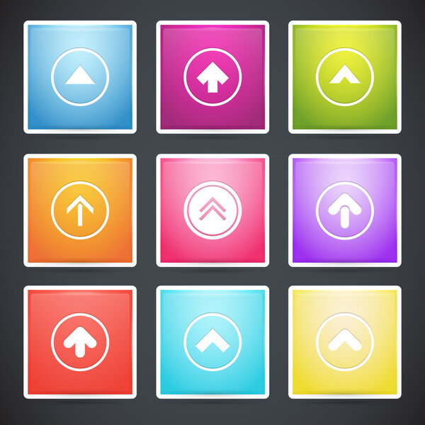 Векторный набор разноцветных кнопок со стрелками
.