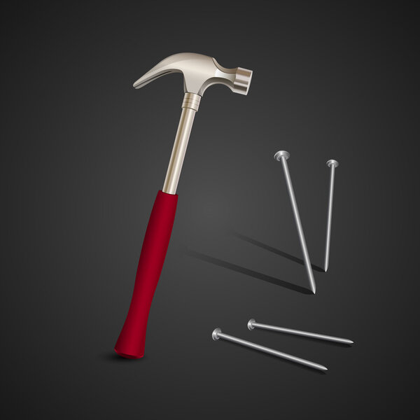 Hammer with nails on dark background