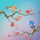 ptáci sedící na větve s jarní květy