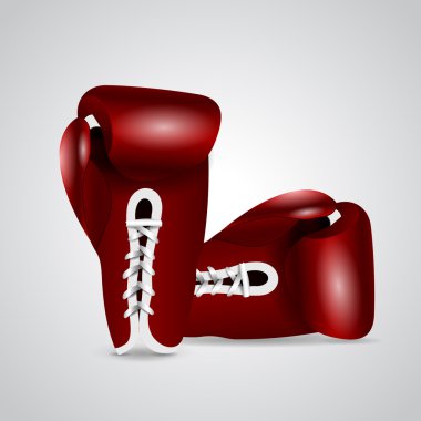 Pair of shiny, red and white boxing gloves on grey background clipart