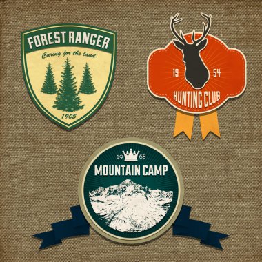 Set of outdoor adventure badges and hunting logo emblems. Vector illustration clipart