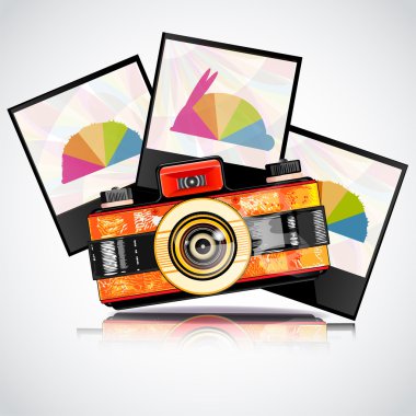 Retro camera with photos clipart