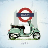 Green vintage scooter in London