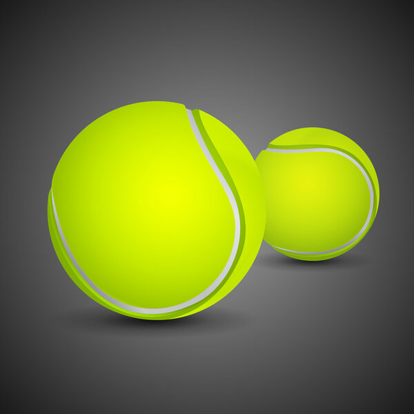 Two yellow tennis balls on black background