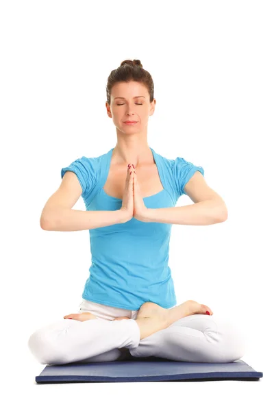 Mujer meditando y haciendo yoga —  Fotos de Stock