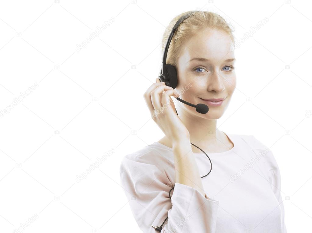 Confident young female customer service agent with headset