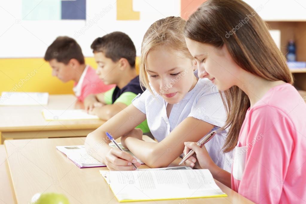 Children are sitting in the classroom