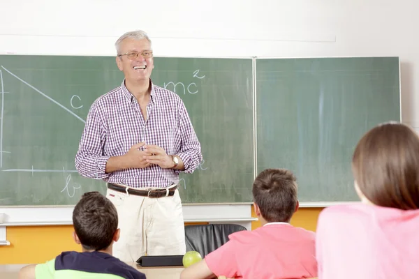 Profesor y estudiante en la lección — Foto de Stock