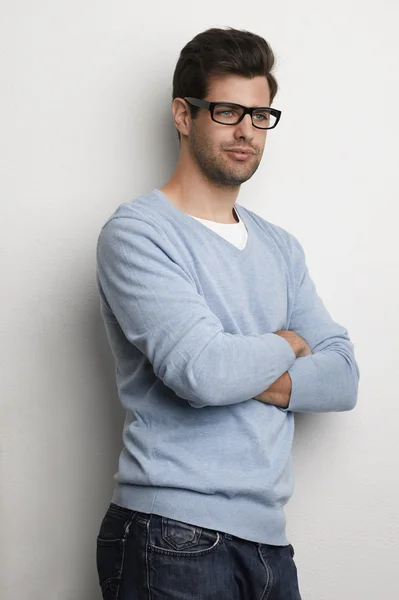 Portrait of young man, against white background. — Stock Photo, Image