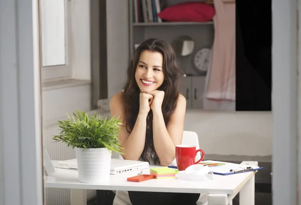 Beautiful woman working at home — Stock Photo, Image