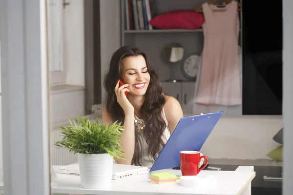 Beautiful businesswoman working at home — Stock Photo, Image