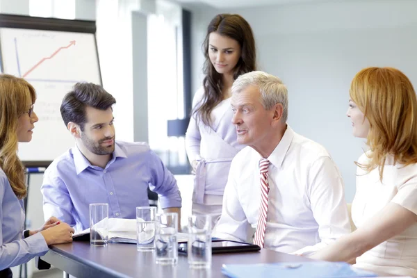 Business people discussing at meeting — Stock Photo, Image