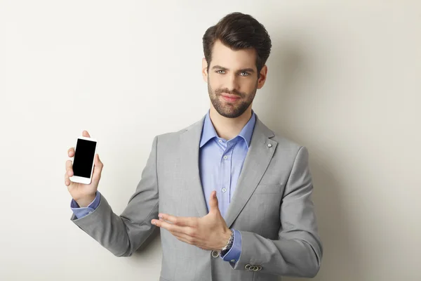 Zakenman met mobile — Stockfoto