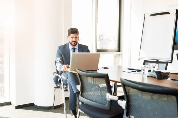 Handsome Businessman Using Laptop While Sitting Office Desk Working Modern — Stok fotoğraf