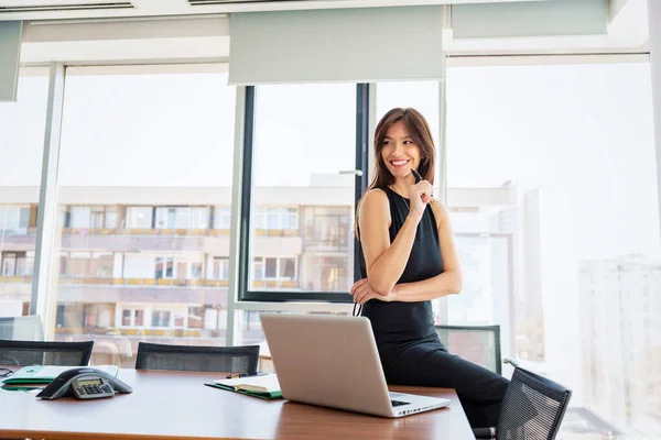 Attractive Businesswoman Toothy Smile Sitting Office — Φωτογραφία Αρχείου