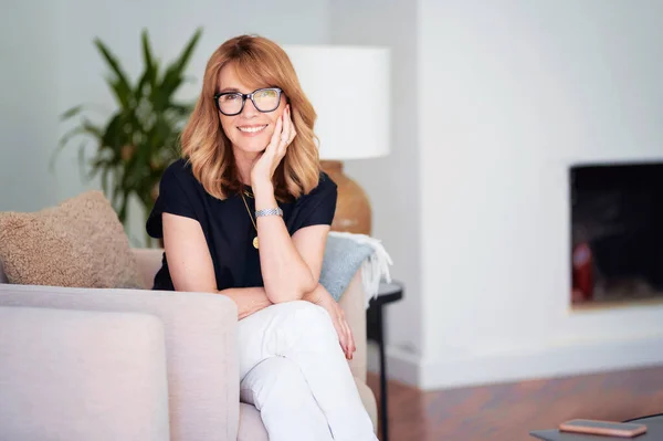 Portrait Confident Middle Aged Woman Looking Camera Smiling While Relaxing — Stockfoto