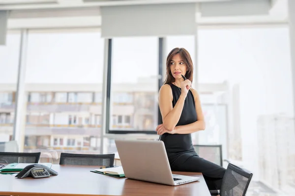 Thinking Businesswoman Wearing Business Casual While Sitting Office Looking Away — ストック写真