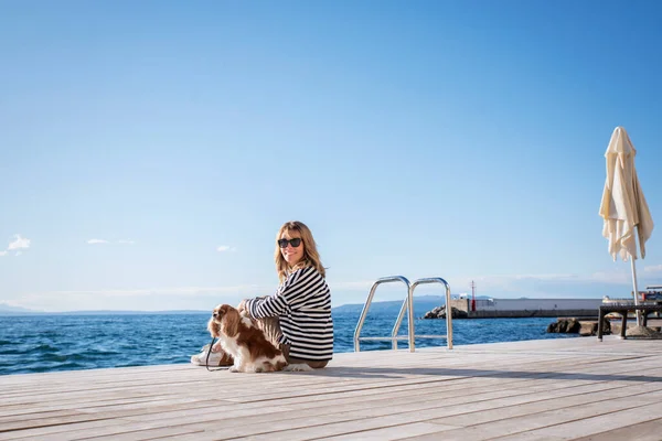 Shot Woman Wearing Striped Sweater While Sitting Her Cute Dog — Stock Photo, Image