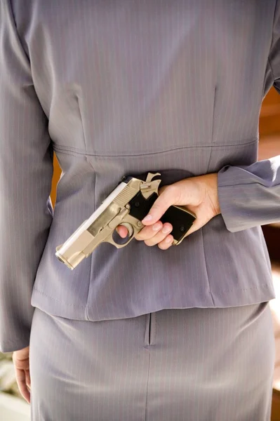 Woman with a gun — Stock Photo, Image