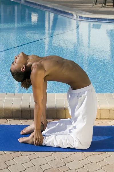 Hispanic male practising Yoga — Stock Photo, Image