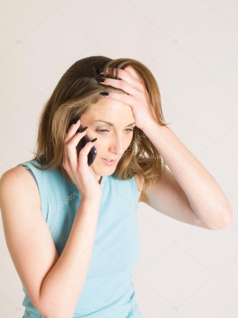concerned woman on phone