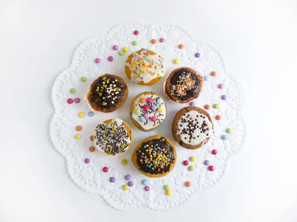 Muffins en la tapa de la torta —  Fotos de Stock