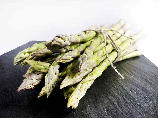 Cut asparagus lying — Stock Photo, Image