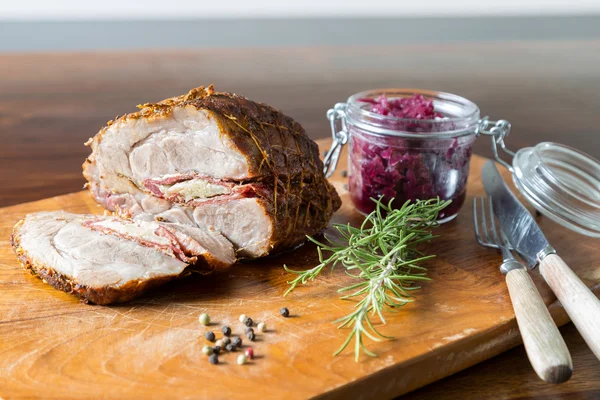 Spit roast with red cabbage — Stock Photo, Image