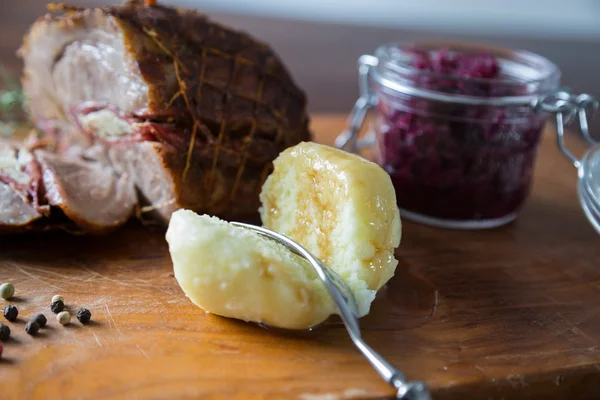 Spit roast with red cabbage — Stock Photo, Image