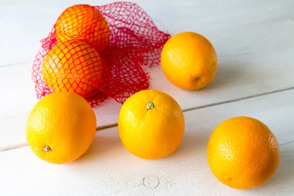 Laranjas na rede — Fotografia de Stock