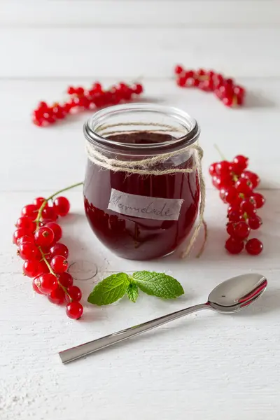 Currant jam in a jar — Stock Photo, Image