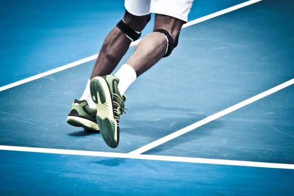 Pernas de tênis — Fotografia de Stock