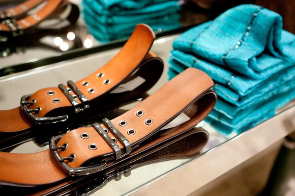 Clothes and Belts On a Rack — Stock Photo, Image