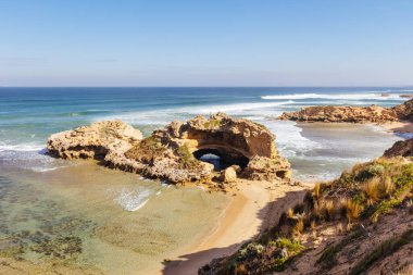 The famous London Bridge near Portsea Surf Beach on a sunny autumn day in Portsea, Victoria, Australia