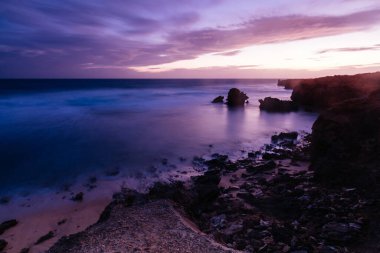 The lesser known Monforts Beach and Rabbit Rock with rockpool formations on a sunny day in Blairgowrie, Victoria, Australia