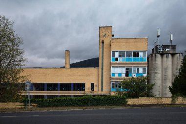 Warburton, Australia - April 20 2022: Abandoned Sanitarium factory at night in the rural town of Warburton in Victoria,. Australia