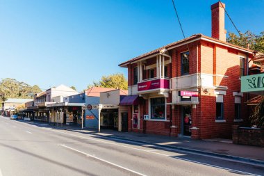 Warburton, Australia - April 22 2022: Early morning light in autumn over the rural town of Warburton in Victoria,. Australia