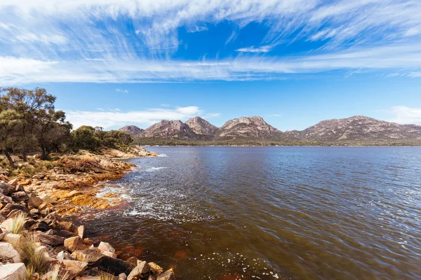 The view from Coles Bay boat ramp area across to the Hazards in Freycinet Peninsula, Tasmania, Australia