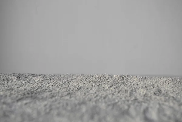 Boční pohled na šedý koberec — Stock fotografie